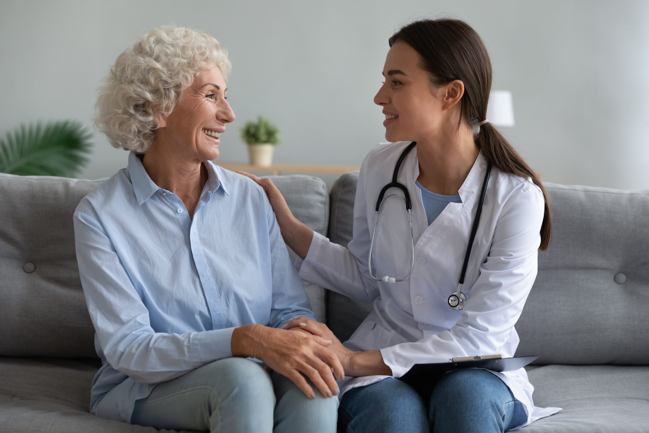 Counselor speaking with a patient counselor meeting patient to discuss questions ask rehab center