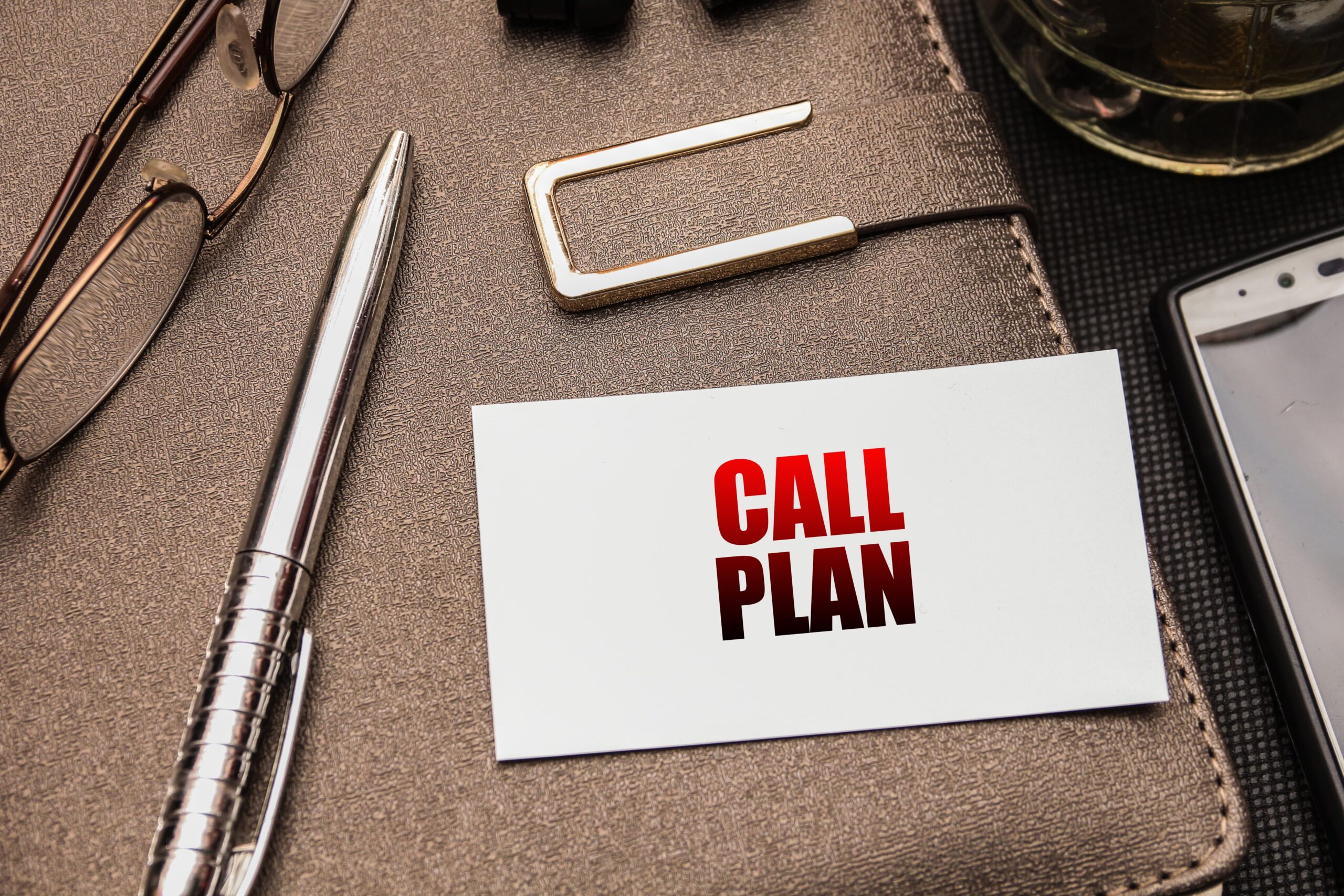 Wallet sized emergency plan card beside phone